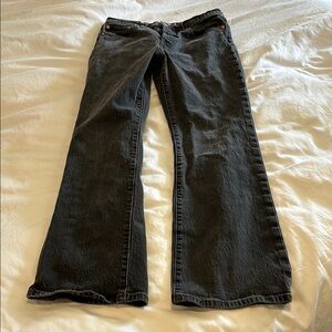 Levi's Washed Black Boot Cut Jeans with Classic Style